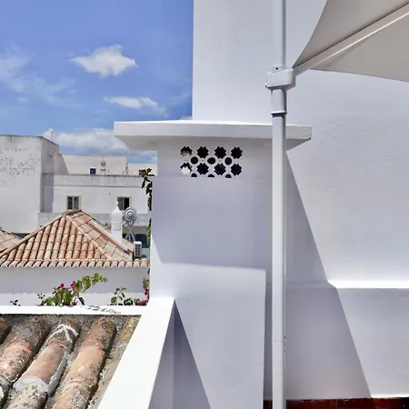 Escape To A Terrace Over Tavira's History