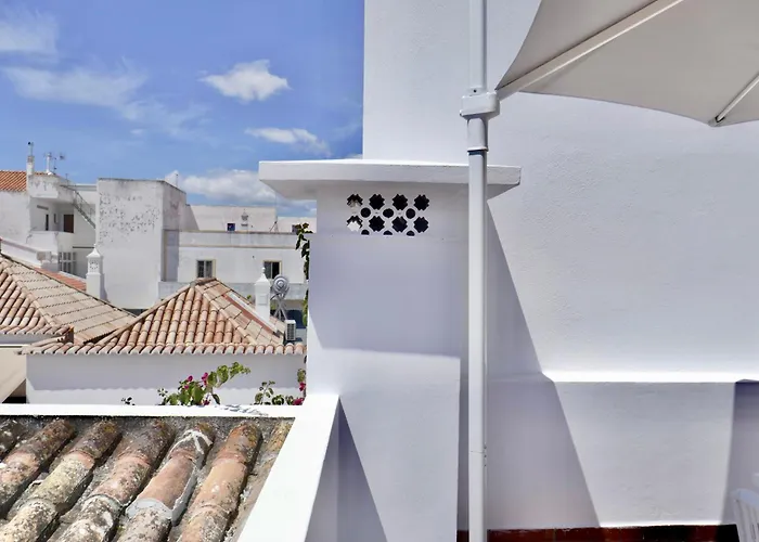 Escape To A Terrace Over Tavira's History